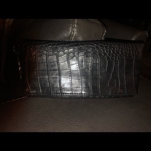 Black clutch with circle silver handle